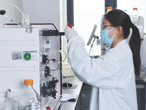 Experimenter purifying a recombinant protein